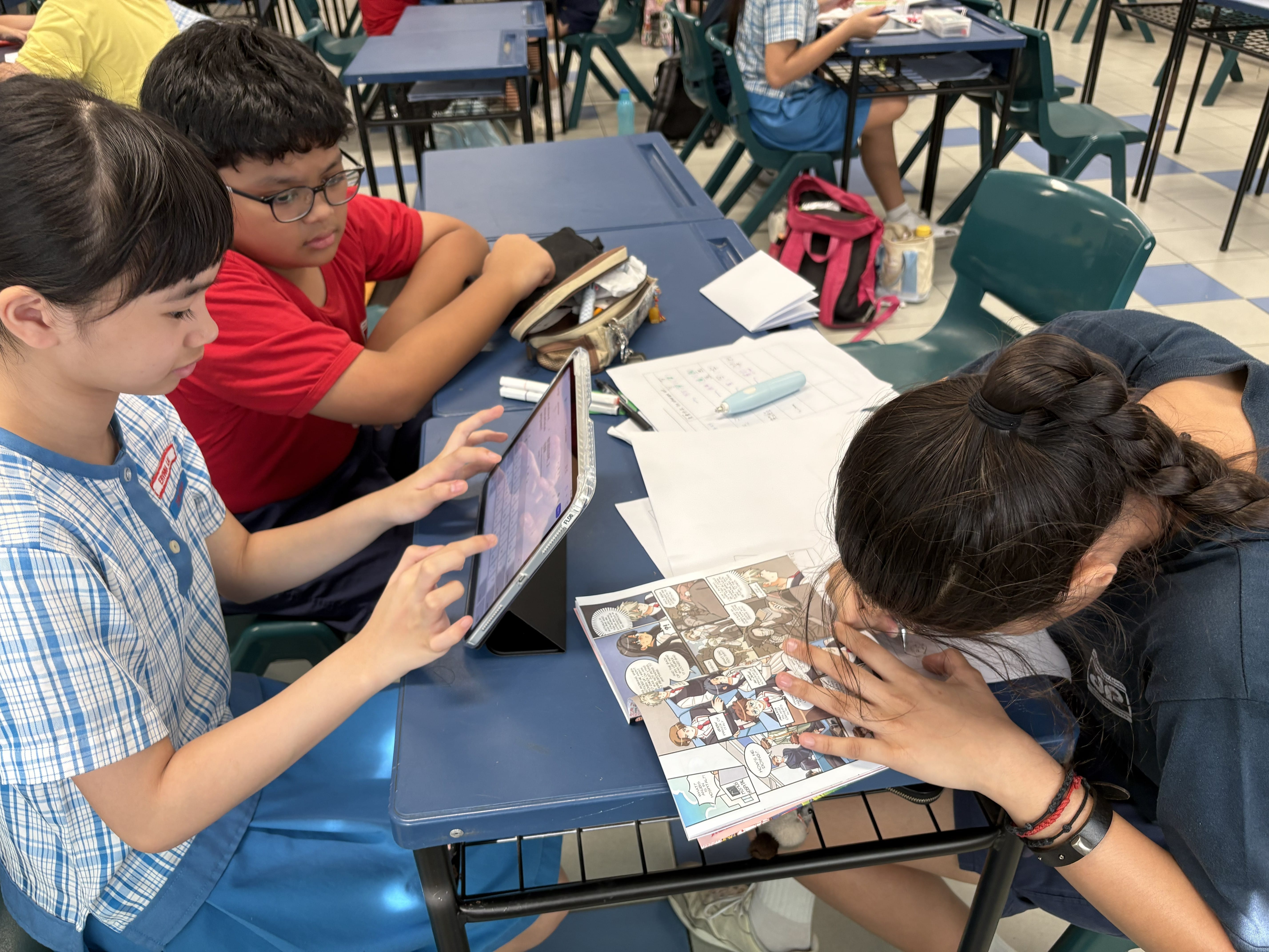 Students using their iPads to reinforce their learning.